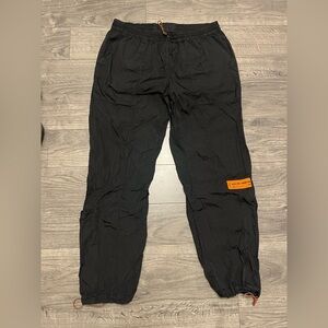 Heron Preston Black Joggers with Orange Patch